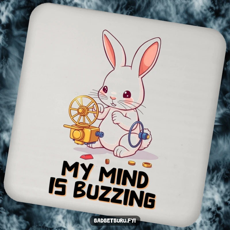 Funny drink coaster illustrated with a rabbit focused on building a miniature, whirring contraption, protecting surfaces with style.