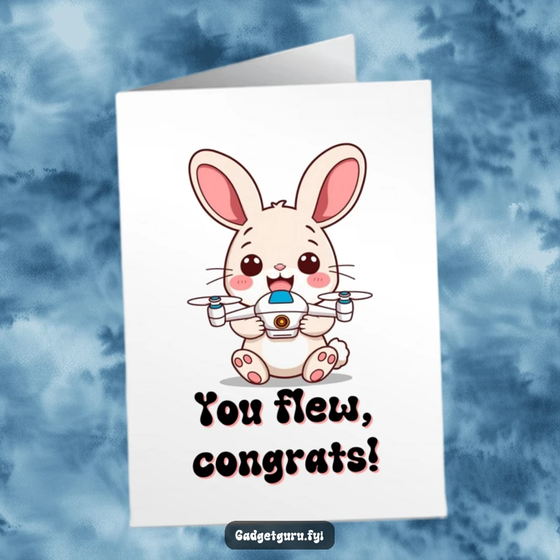 Funny free printable congratulations card with a happy rabbit holding a tiny drone, celebrating a successful mission with energetic ears.