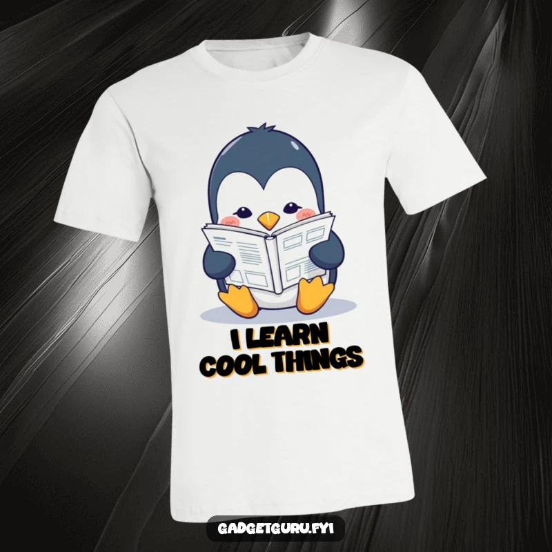 Funny penguin t-shirt featuring a studious character engrossed in a small tech manual, highlighting a passion for learning.