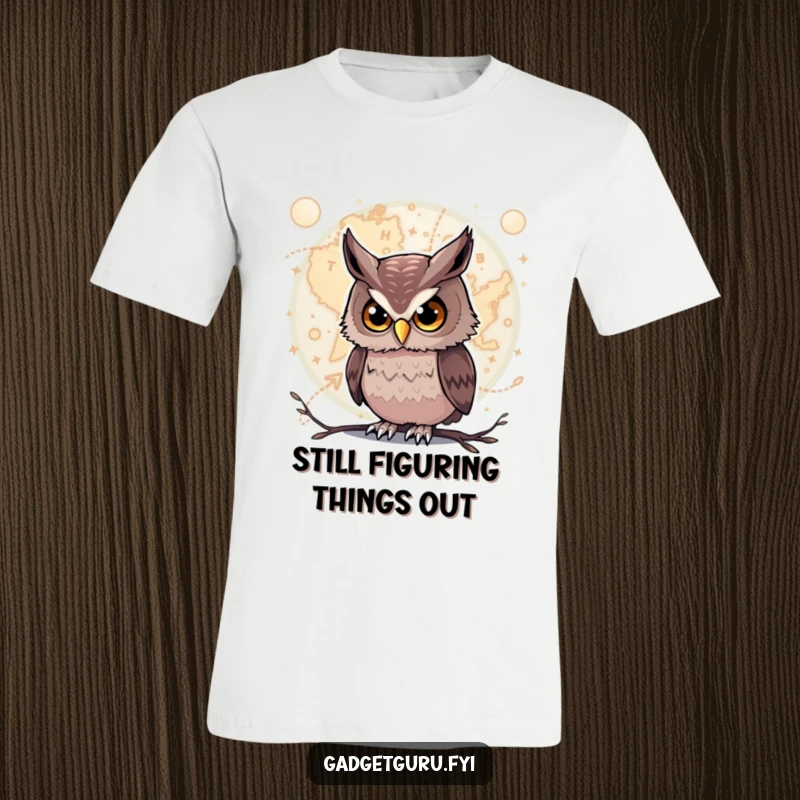 Funny Owl T-Shirt: A curious owl peers intently at a complex, glowing map, highlighting intelligence and adventure.