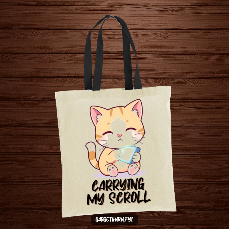 Funny tote bag showcasing a curious cat reaching out a paw to touch a small, bright digital screen.